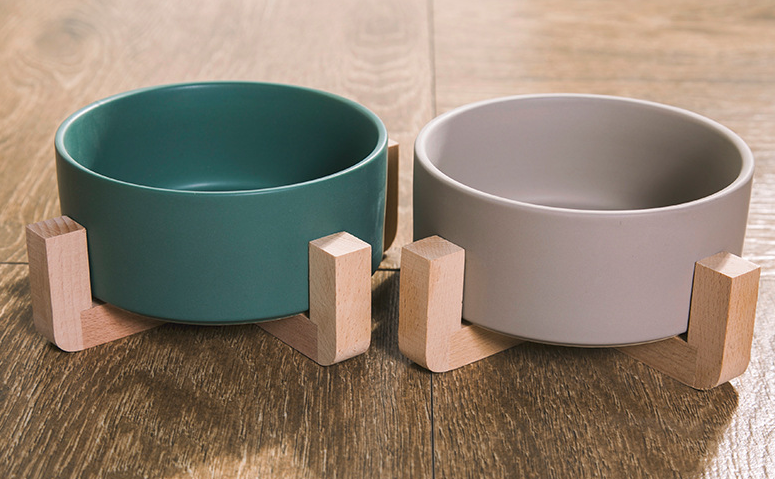 Elevated ceramic pet bowl with wooden stand
